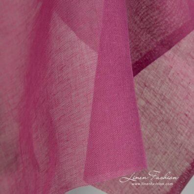 Linen fabric dark hot pink transparent close up edge view
