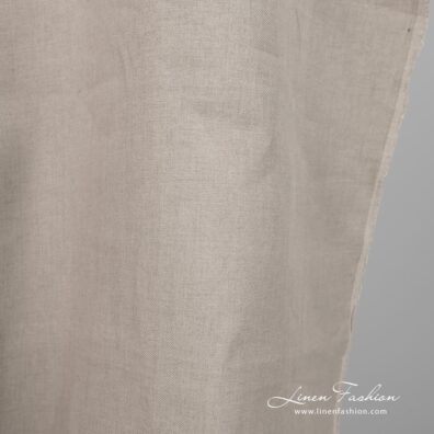 Linen fabric natural colour twill weave pattern close edge view