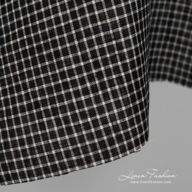 Black linen fabric with white checks close up detail view