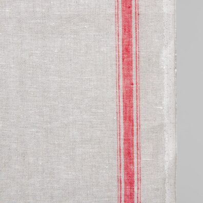 Narrow linen fabric light grey colour with red stripes close up edge