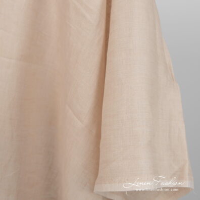 Lightweight linen fabric yellowish beige colour close up detail