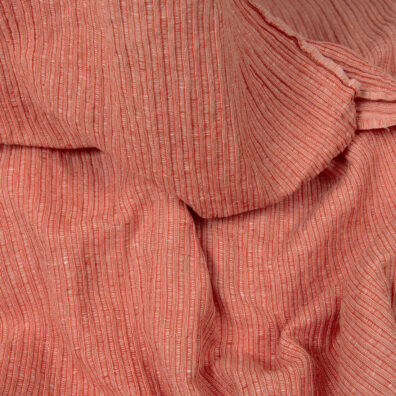 Washed linen cotton fabric in red-white stripes detail view
