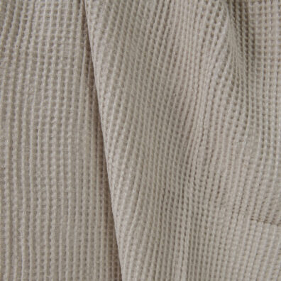 Washed linen cotton fabric beige waffle close up detail