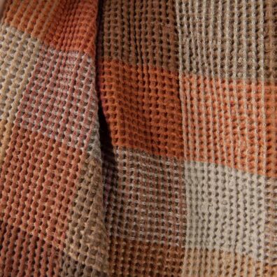 Washed linen cotton fabric brown colour checks waffle close up detail