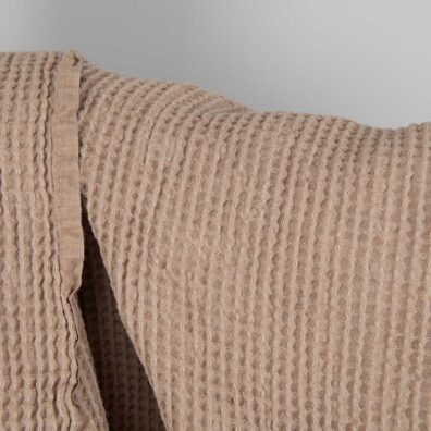 Washed linen cotton fabric light brown waffle close up detail