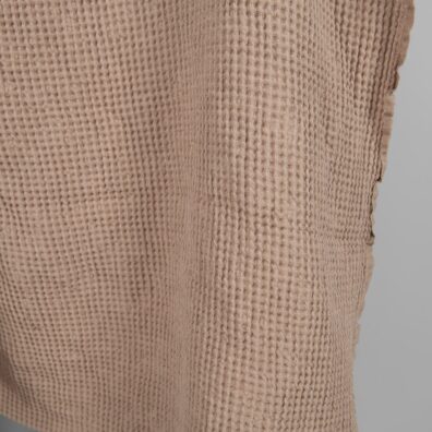 Washed linen cotton fabric light brown waffle edge view