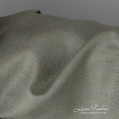 Linen cotton fabric in greyish green diamond pattern close up detail