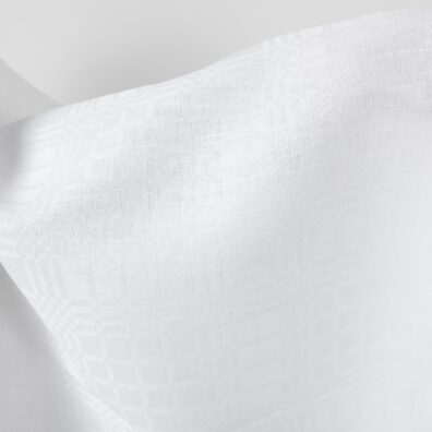 Linen cotton fabric bright white checks pattern close up detail