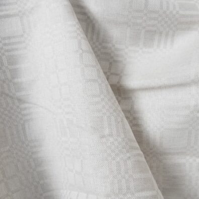 Linen cotton fabric in light beige checks detail view