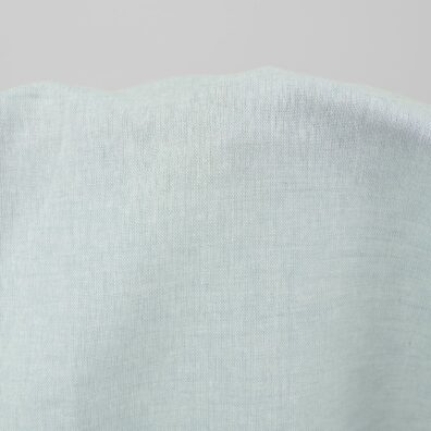 Wide linen cotton fabric pale turquoise colour close up detail