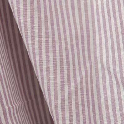 Wide linen cotton fabric in white and lilac stripes close up detail