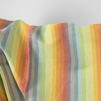 Linen cotton fabric in rainbow colour stripes close up