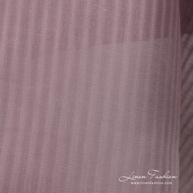 Linen fabric lilac colour with patterned stripes close up detail