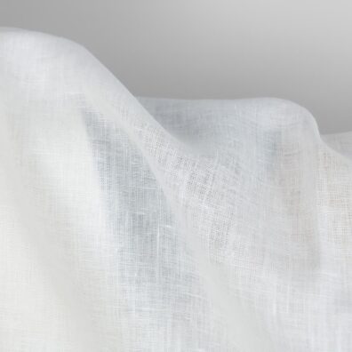 Linen fabric in plain off-white colour close up detail