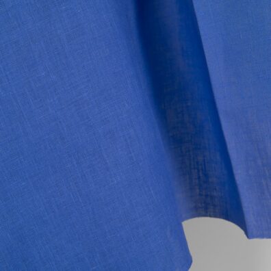 Linen fabric plain vibrant blue colour close up detail