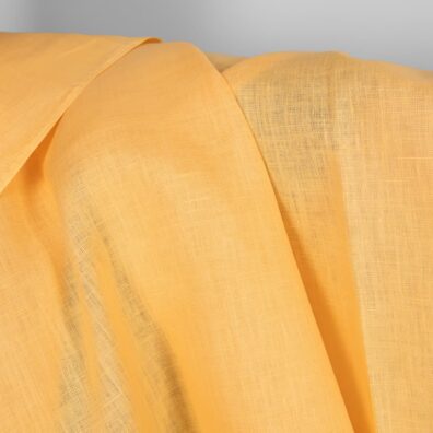 Linen fabric in banana cream colour texture