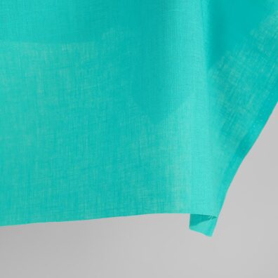 Linen fabric in blue curacao colour edge