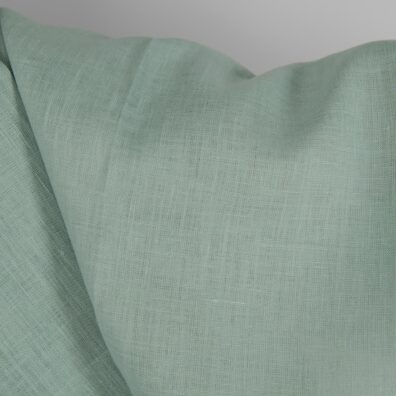 Linen fabric in jadeite colour close up detail