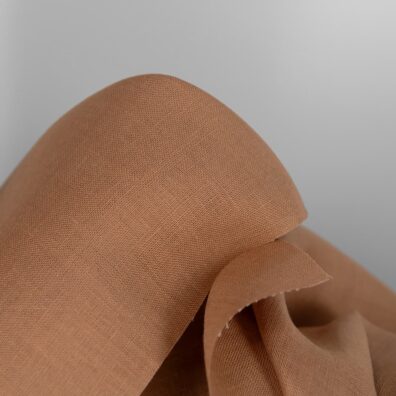Linen fabric in indian tan colour texture