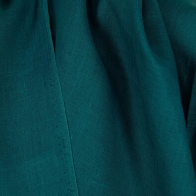 Linen fabric in lyons blue colour close up detail