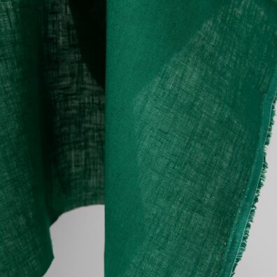 Linen fabric vibrant dark green colour edge
