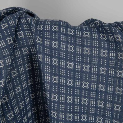 Washed linen cotton fabric off-white and blue pattern blue side