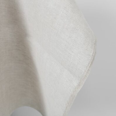 Linen fabric beige in herringbone pattern edge