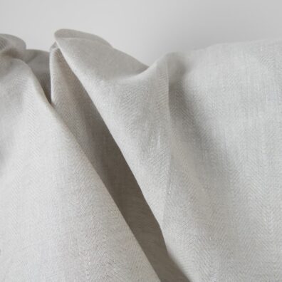 Linen fabric beige in herringbone pattern texture