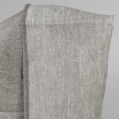 Linen fabric greyish brown in herringbone pattern back side