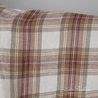 Wide washed half linen fabric off-white with brown checks close up detail