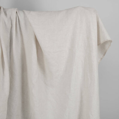 Washed linen wool fabric beige in herringbone pattern