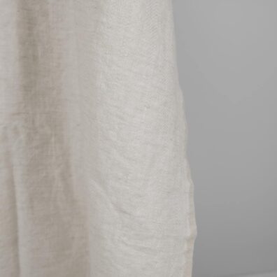 Washed linen wool fabric beige in herringbone pattern edge