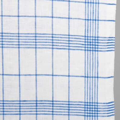 Narrow linen fabric bright white with blue checks close up detail