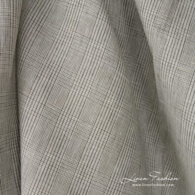 Linen fabric light beige with green checks close up detail
