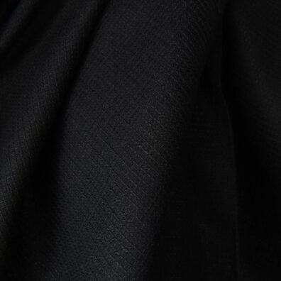 Linen fabric solid black waffle close up detail