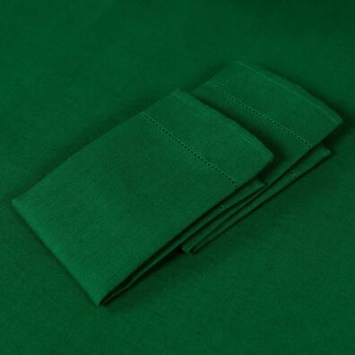 Linen cotton emerald green napkin on table