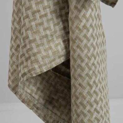Green linen patterned bath towel, washed