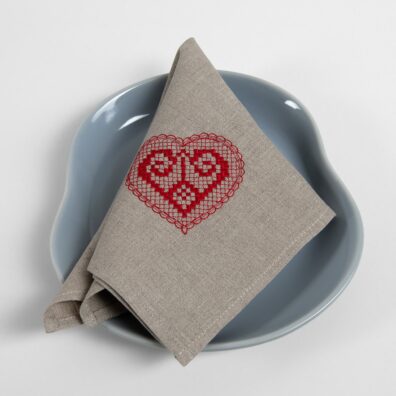 Natural linen napkin with red embroidery