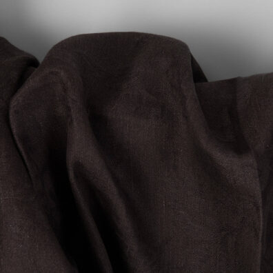 Brown linen fabric with flowers and leaves