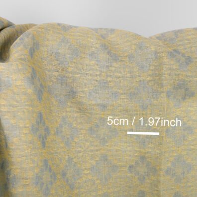 Linen fabric in light blue and yellow floral jacquard, 5cm pattern