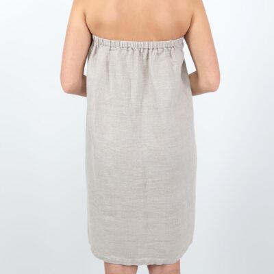 Grey towel with a button from backside