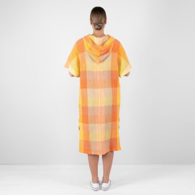 orange linen poncho from backside.
