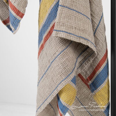 ZELDA Bath towel beige striped 5 Linen cotton beige bath towel with yellow, blue, red stripes.