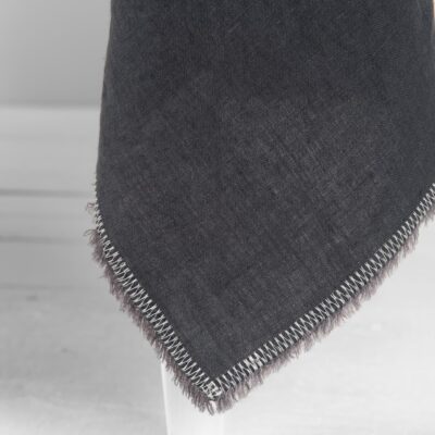 ALBA Tablecloth grey 8 linen grey tablecloth with decorative seam and loose fringes.