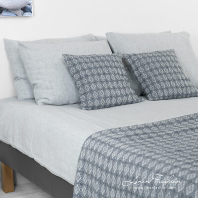 linen cotton blue grey bedlinen with throw and cushions.