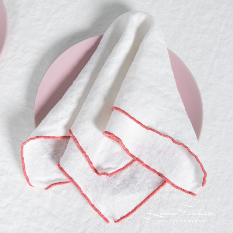 ARVO white linen napkin with rosy border