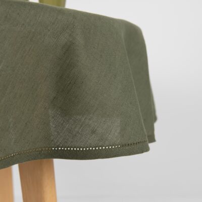 round olive linen tablecloth with hemstitch.
