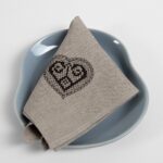 HARTY Table napkin natural with brown embroidery