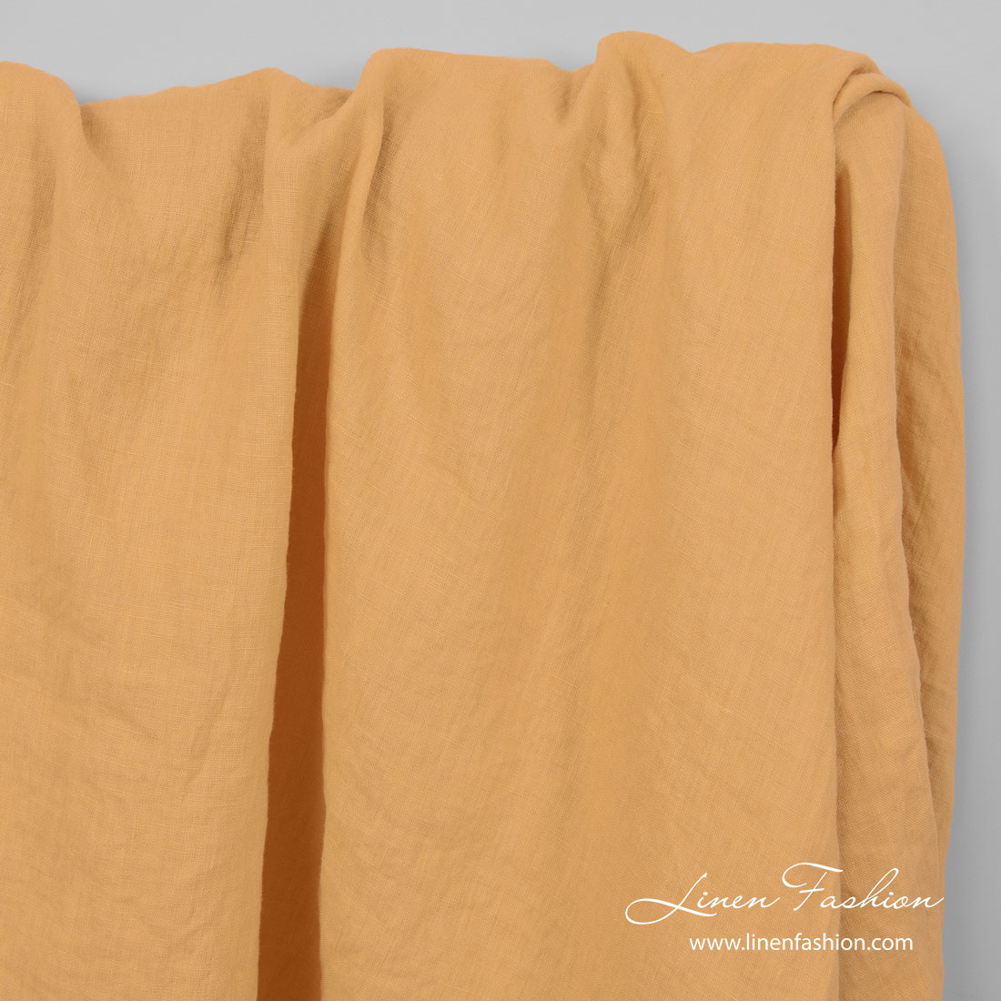 Peach yellow color linen fabric, washed