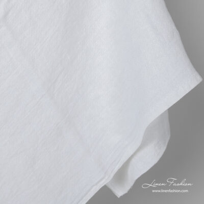 Washed bright white linen fabric in small squares